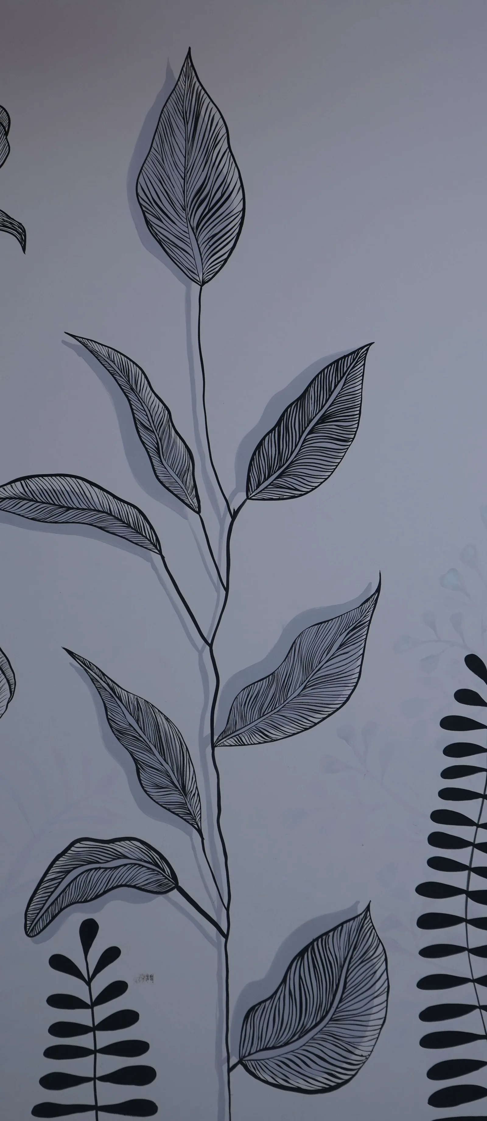 Detail: broad leaves drawn in ink, their veins picked out by hand